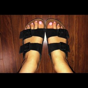 Black suede Birkenstock’s